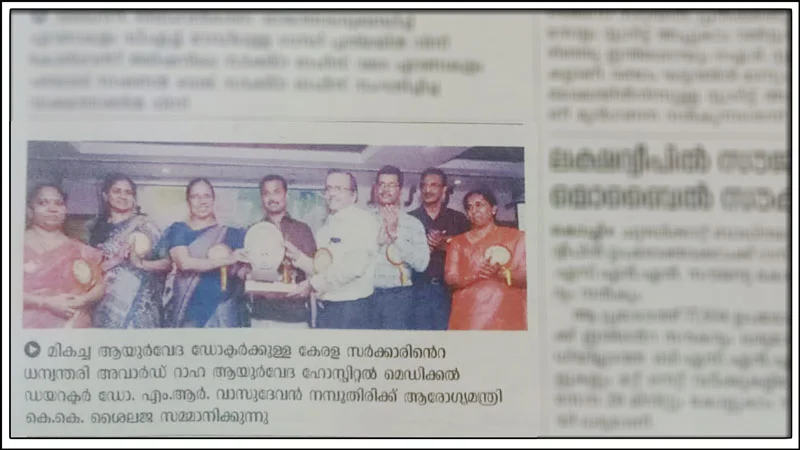 Dr MRV Namboothiri Receiving Award for Best Ayurveda Doctor